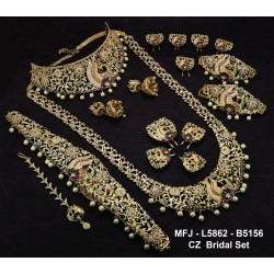 Australian Wight,Red & Green Stones With Perls Peacock Design Gold Plated Full Bridal Set  Buy Online