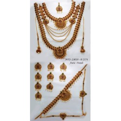 Ruby,Emerald Stones With Pearls Drops Mango&Flower Design Antic Plated Finished Full Bridal Set  Buy Online