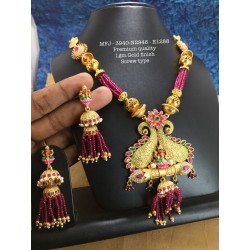 CZ,Ruby&Emerald Stones with Pearls Kasu Lakshmi&Flower,Hanging Type Design Earrings Gold Mat Finish Haram Set Buy Online