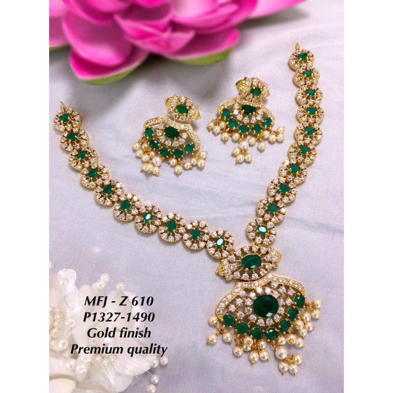 Emerald Green Stone Layered Necklace Set | Shobitam Jewelry | Emerald green  stone, Necklace set, Layered necklace set