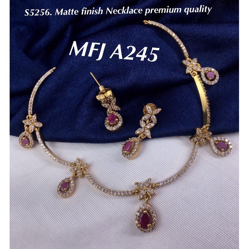 Designer pink CZ golden necklace necklace set at ₹4950 | Azilaa