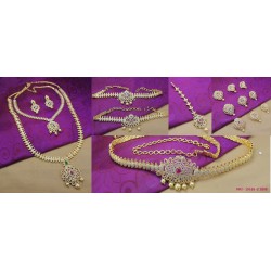 CZ, Ruby & Emerald Stones With Pearls Drop Mango Design Gold Plated Finish Combo Bridal Set Buy Online