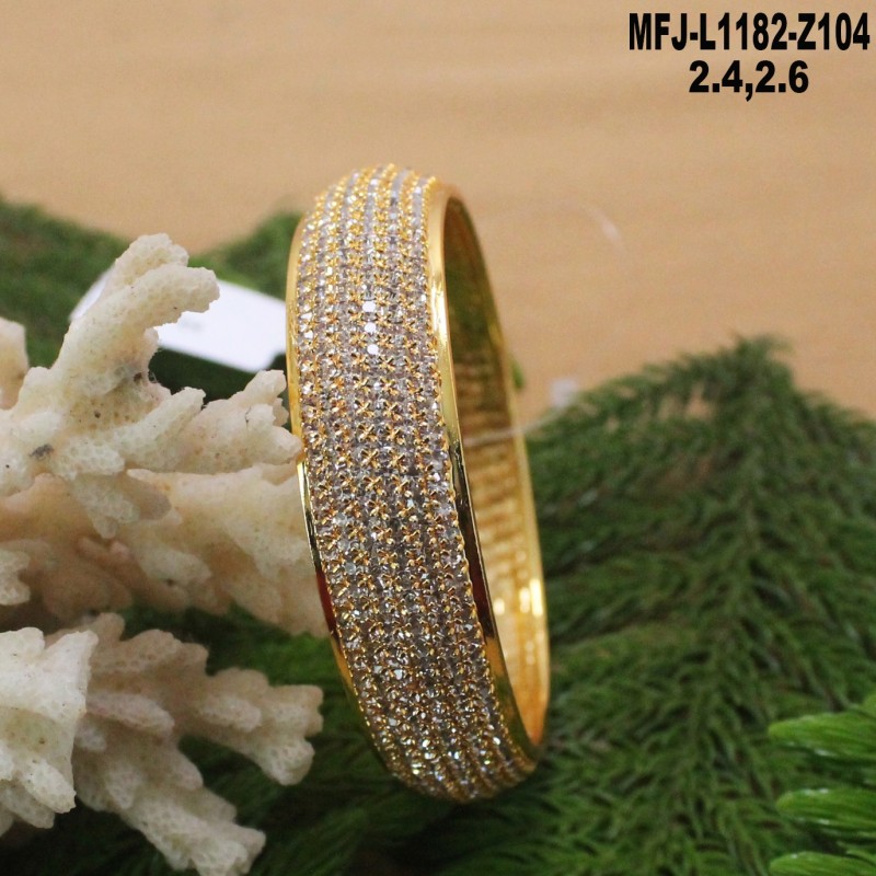 2.4 Size CZ, Ruby & Emerald Stones Designer Gold Plated Finish Two Set Bangles Buy Online